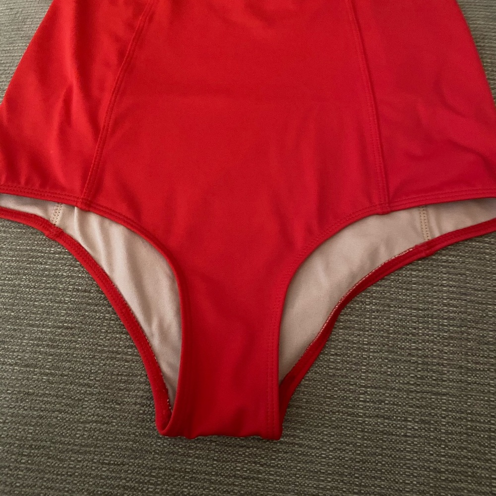 Kortni Jeane tomato red bottoms.